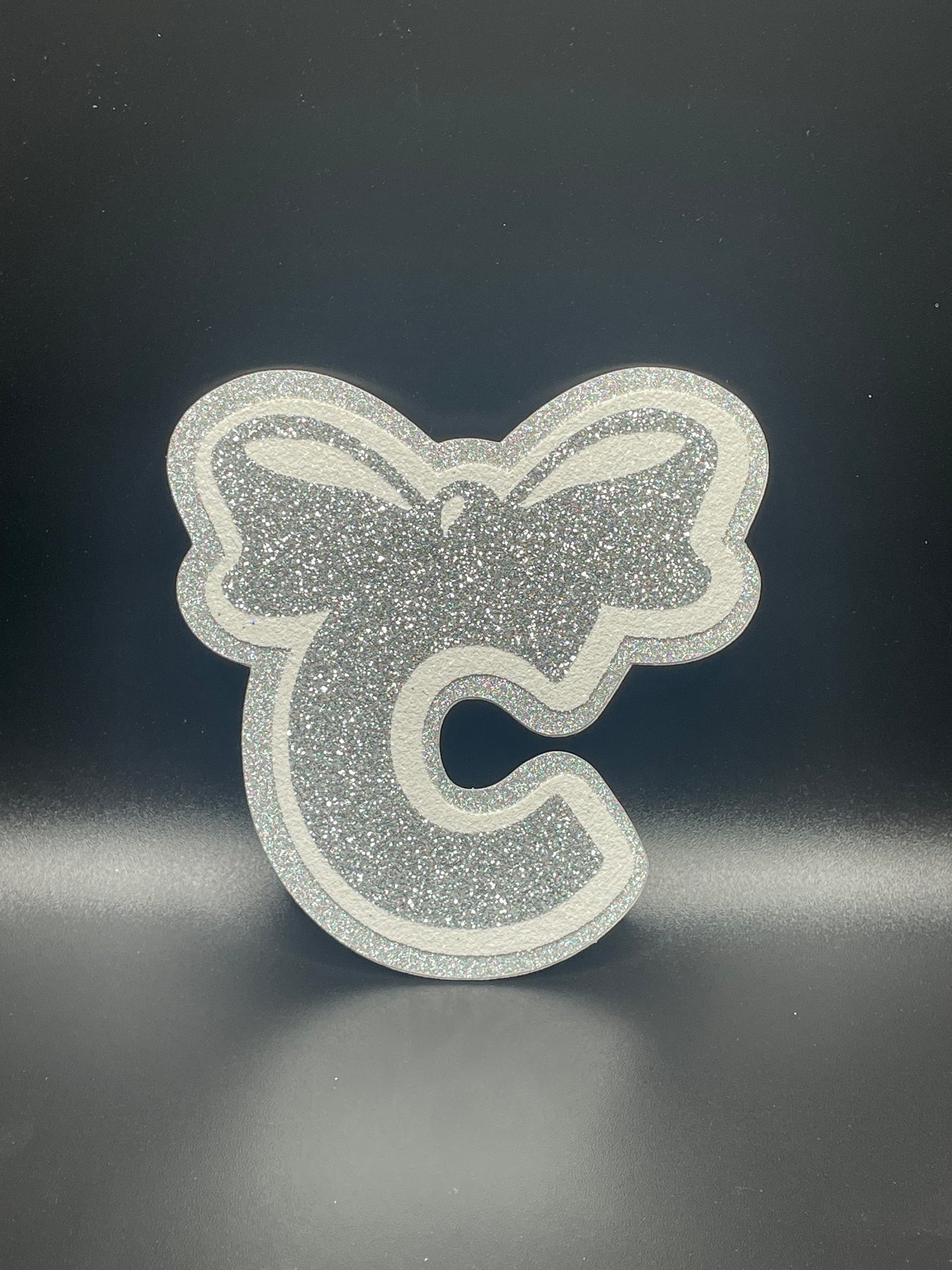 C with a bow, Silver
