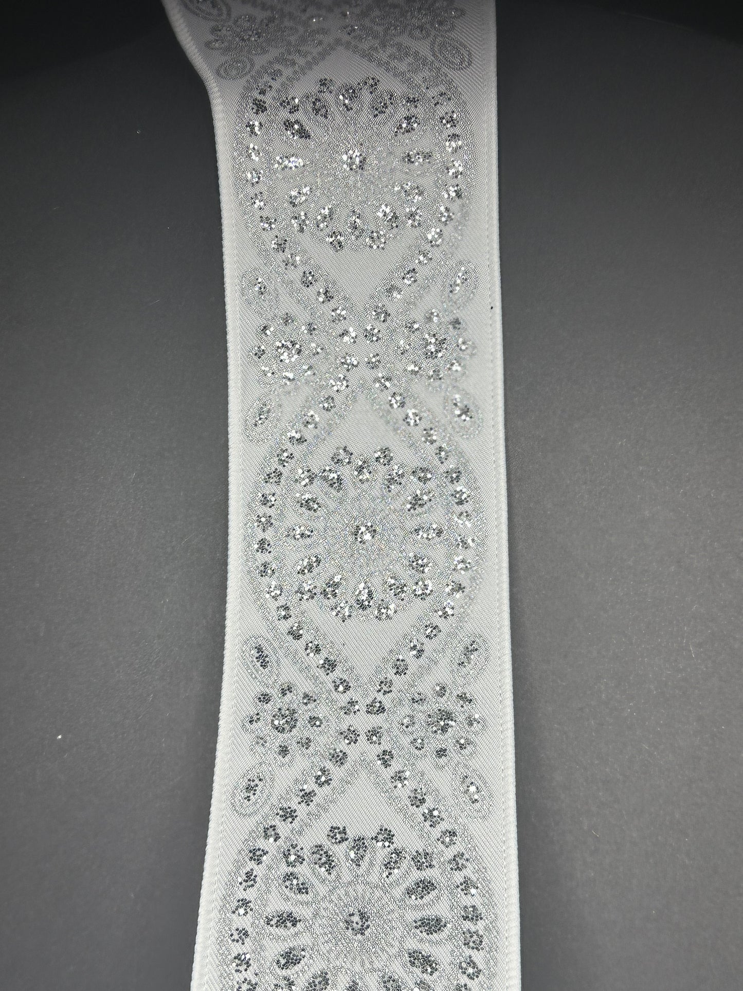 White ribbon with jeweled flower design (Included)