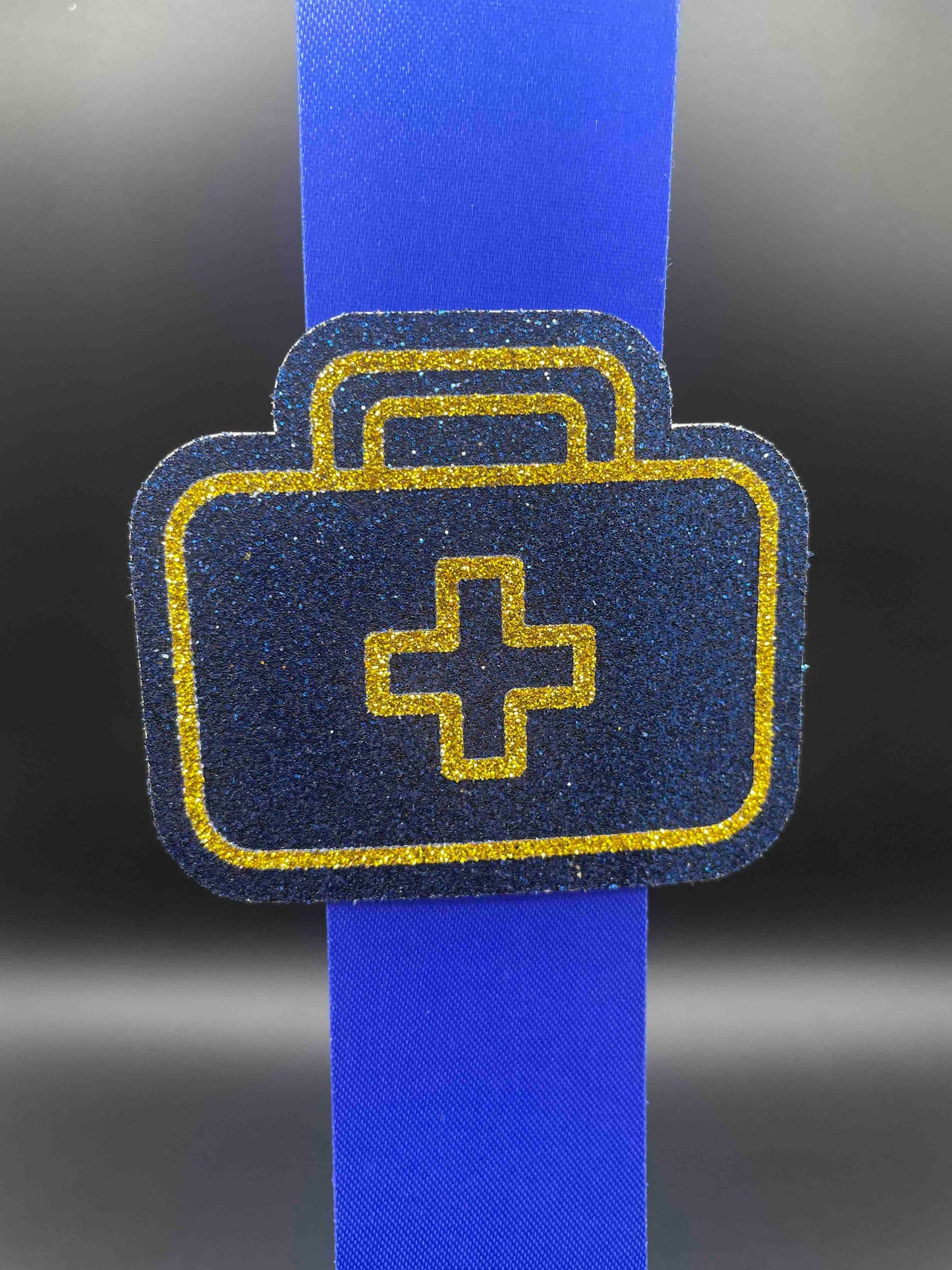 Trainer/HOSA, Blue - Signature Trinket  (included)