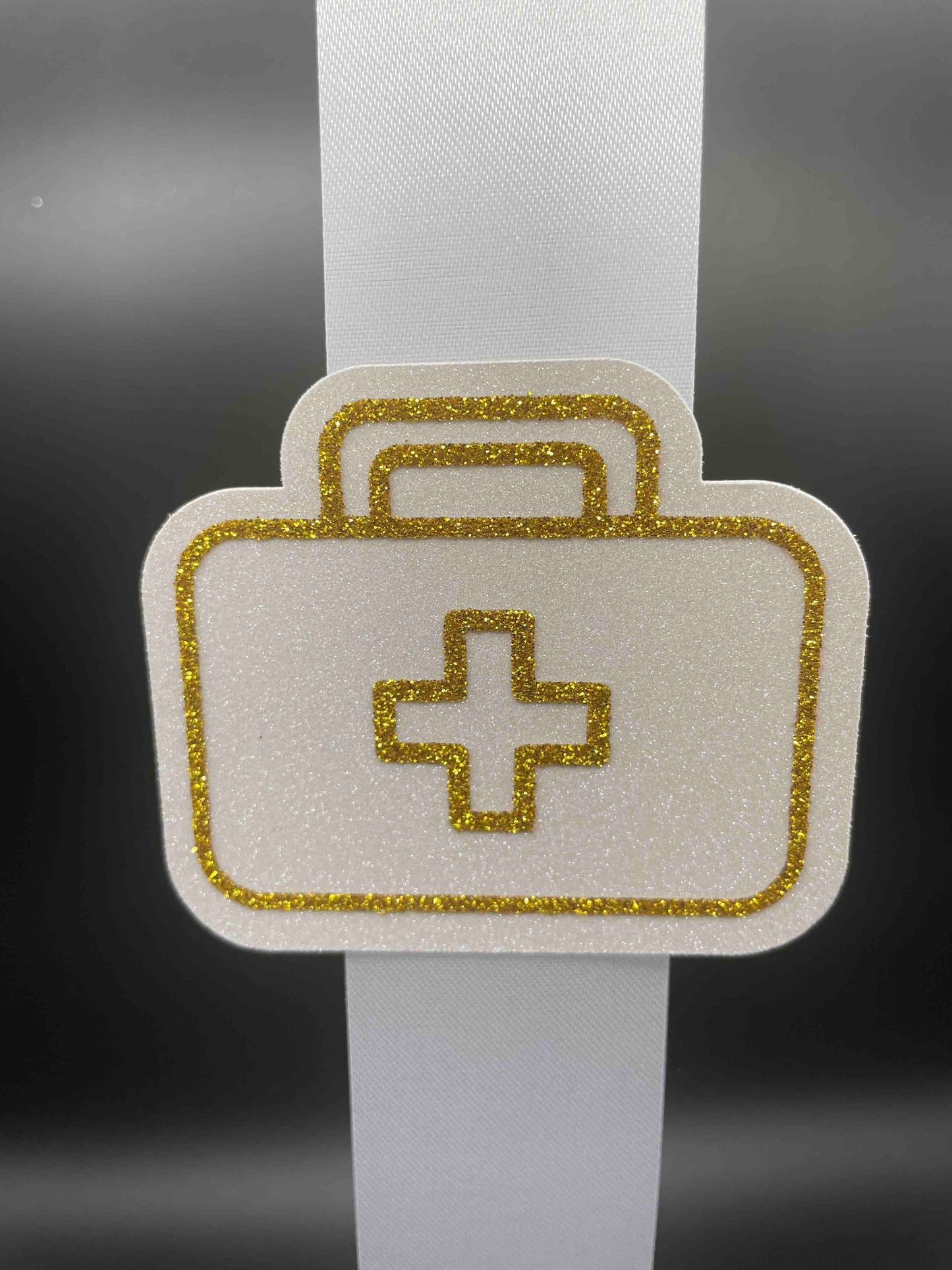 Trainer/HOSA, Gold - Signature Trinket  (included)